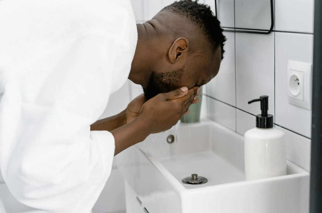 a man washing his face