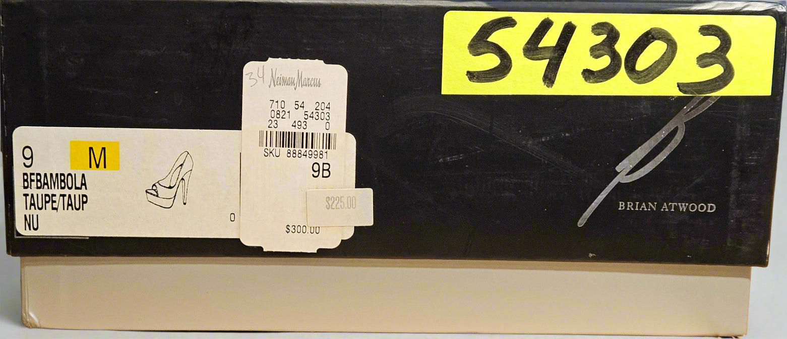 Shoe box with a yellow label on a cardboard surface