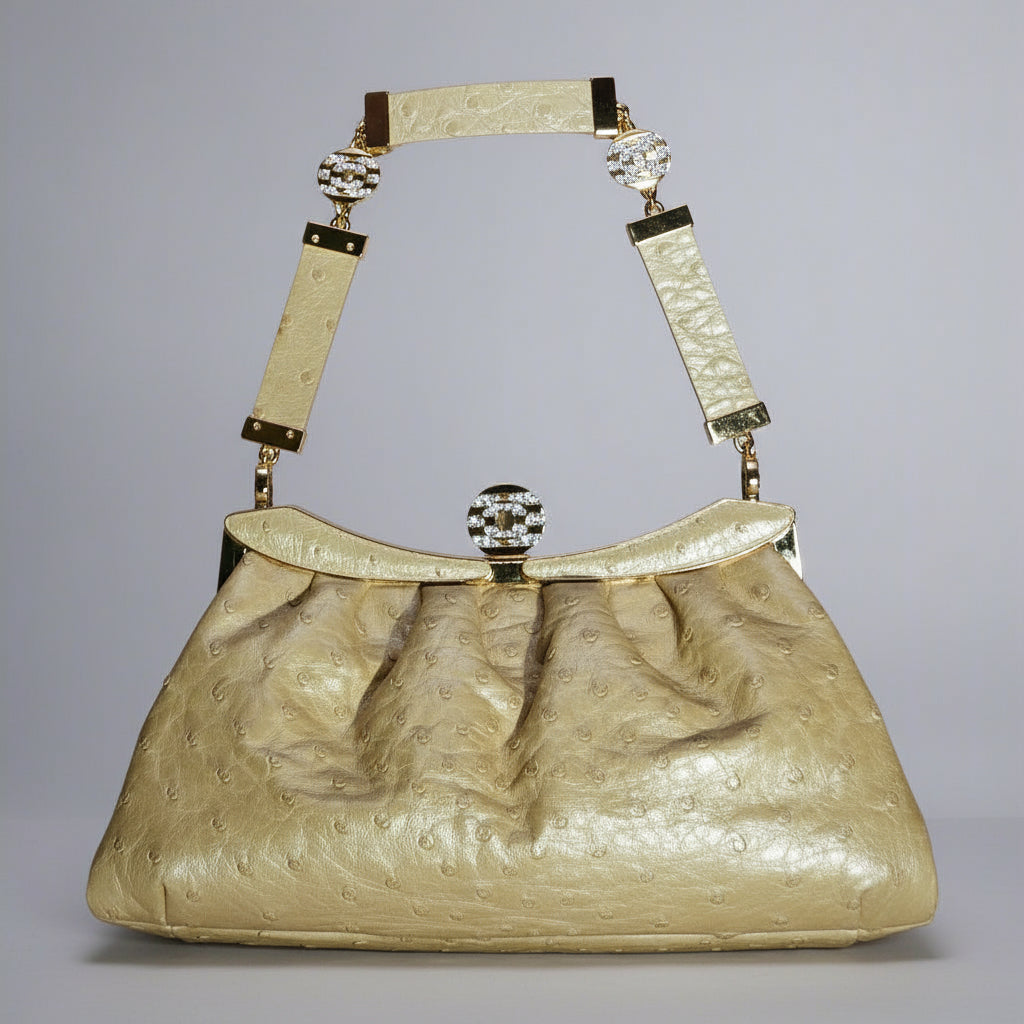 Loved By Lea: Bvlgari Vintage Crystal Logo Frame Bag in Gold Ostrich Leather
