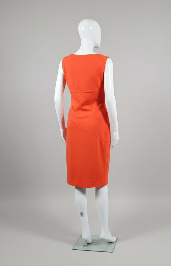 Red skirt on a mannequin against a neutral background