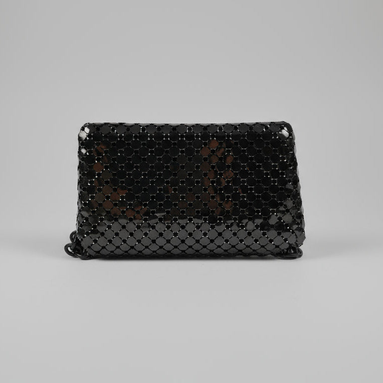 Black beaded clutch bag on a white background