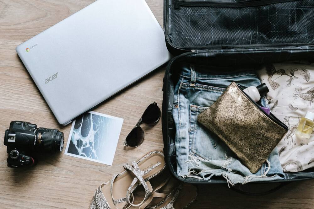 packing essentials in a suitcase