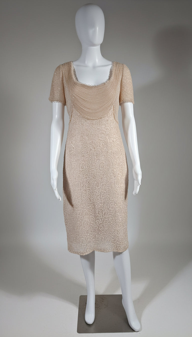 Beige dress on a mannequin against a neutral background