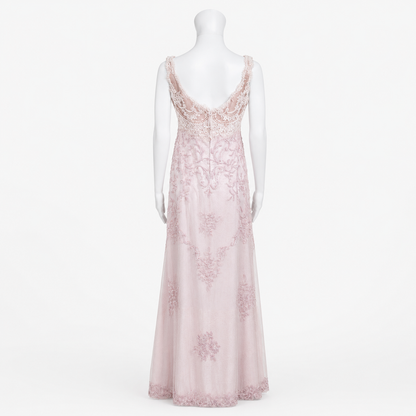 Pink lace dress on a mannequin against a white background