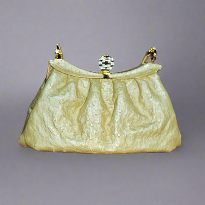 Loved By Lea: Bvlgari Vintage Crystal Logo Frame Bag in Gold Ostrich Leather