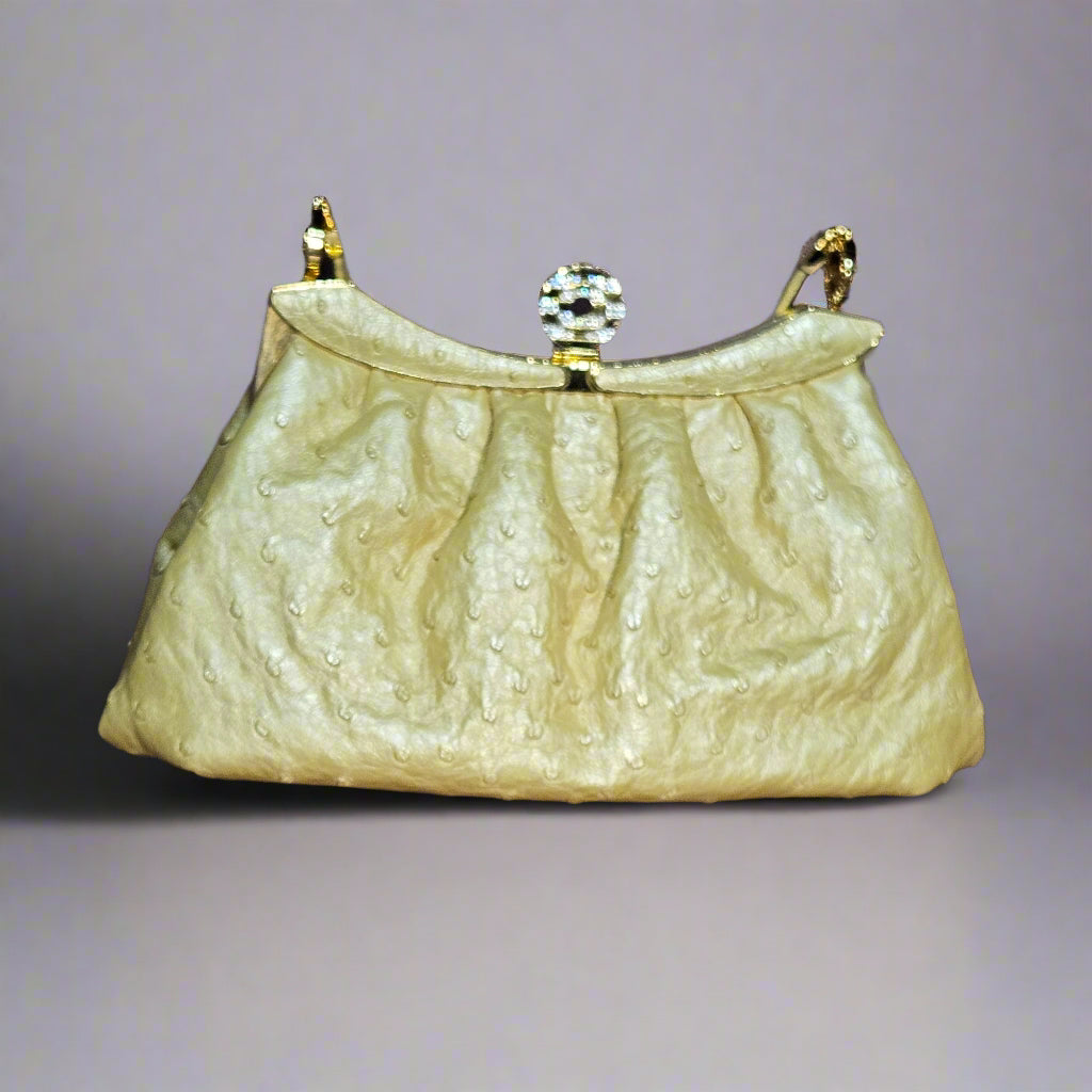 Loved By Lea: Bvlgari Vintage Crystal Logo Frame Bag in Gold Ostrich Leather