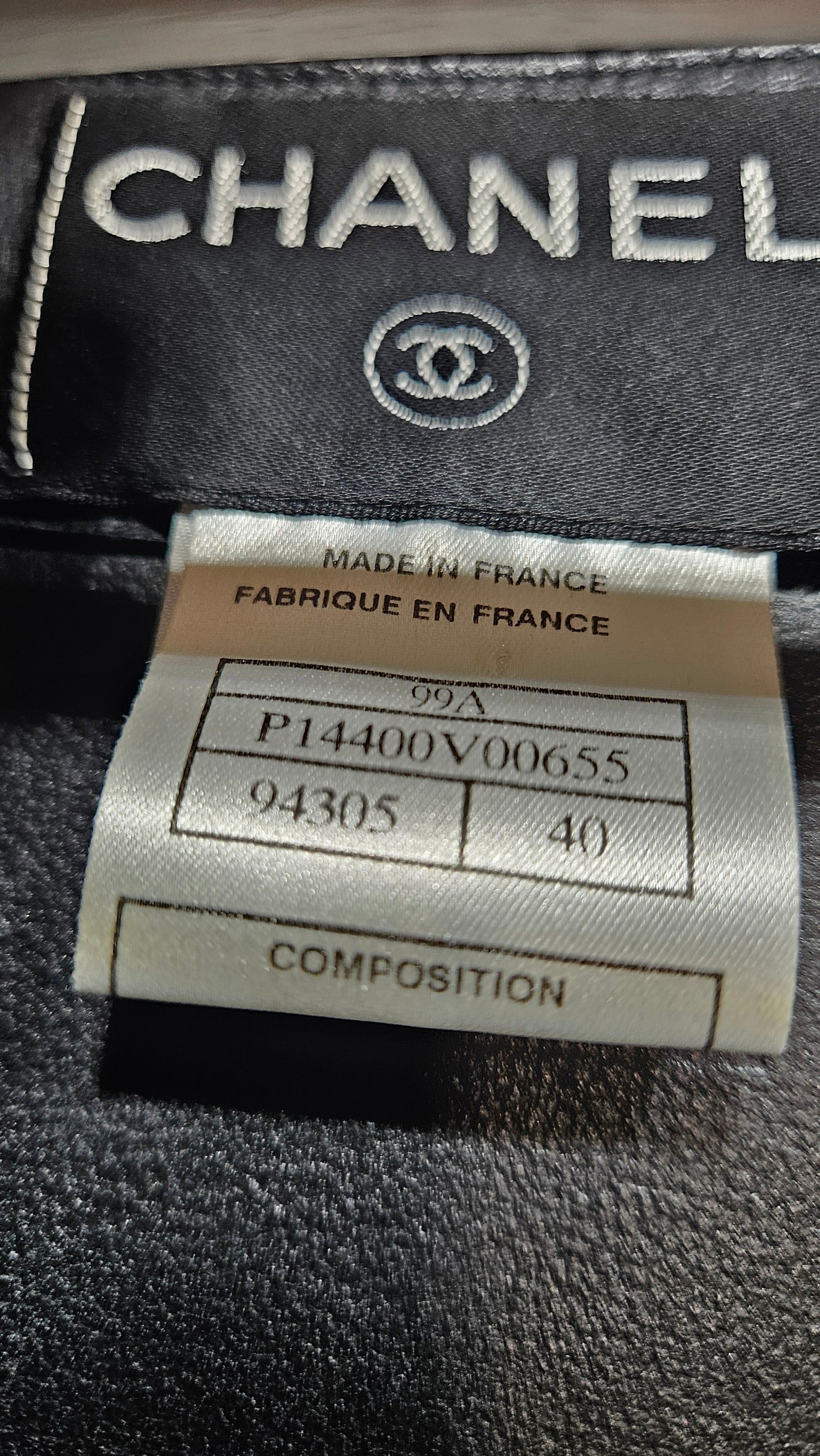 Chanel label on a garment with visible branding and text.