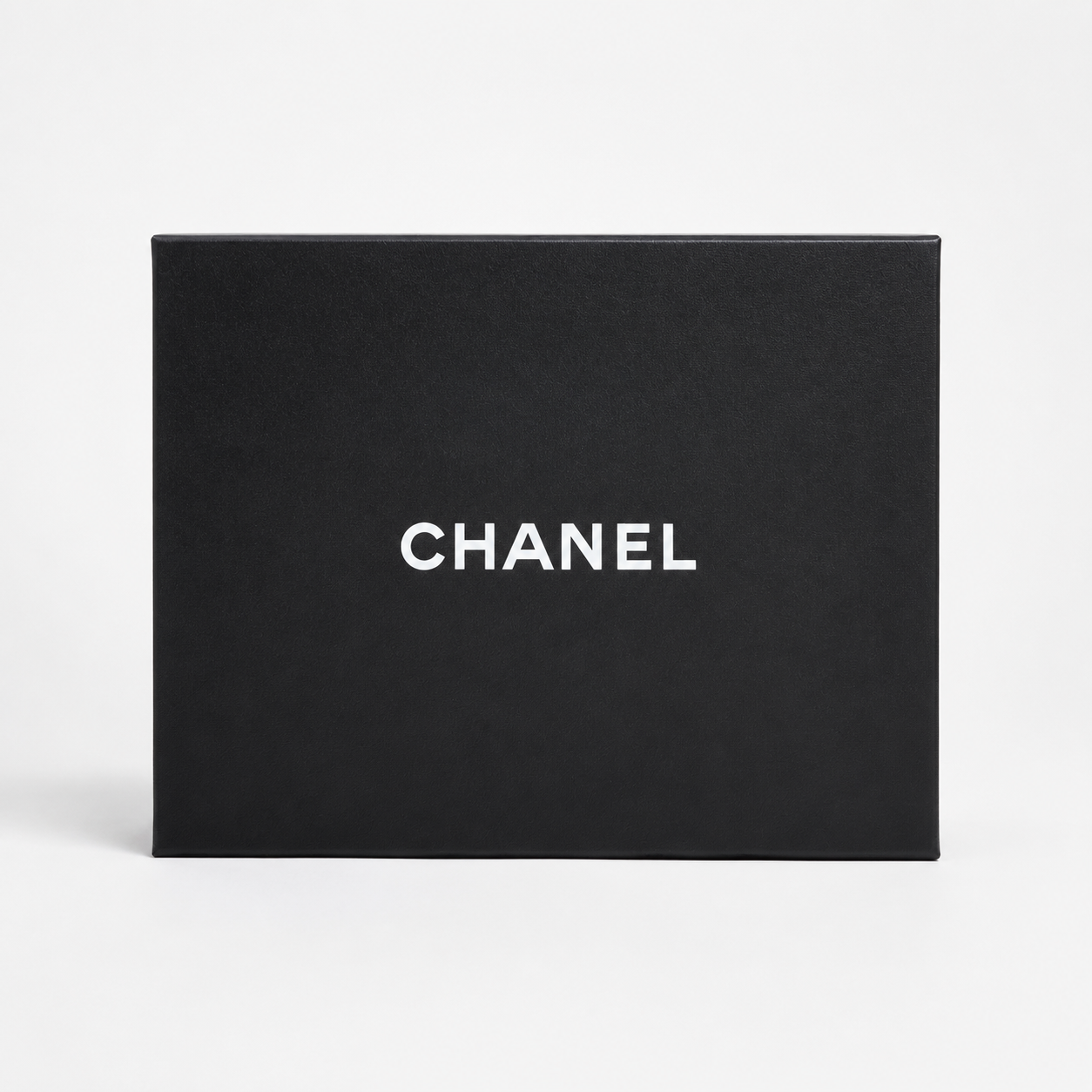 Black Chanel box on a white background