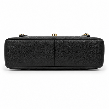 Black leather handbag with gold hardware on a white background