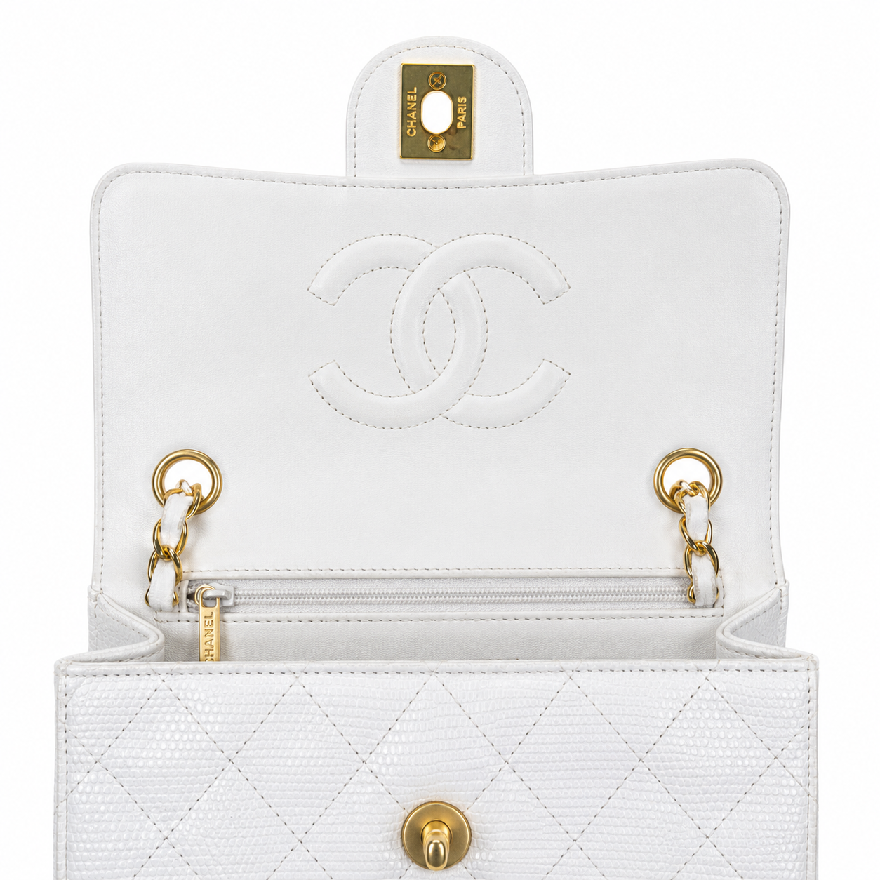 White quilted handbag with gold hardware and Chanel logo on a white background