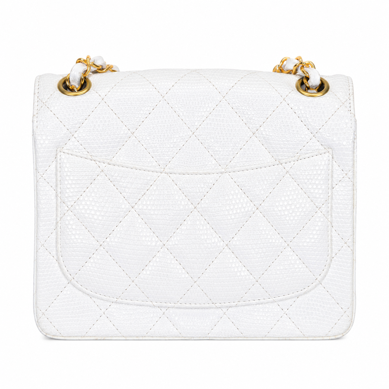 White quilted handbag with gold hardware on a white background