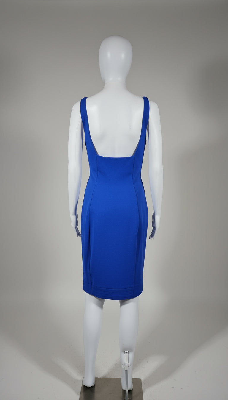 Mannequin wearing a blue dress against a gray background