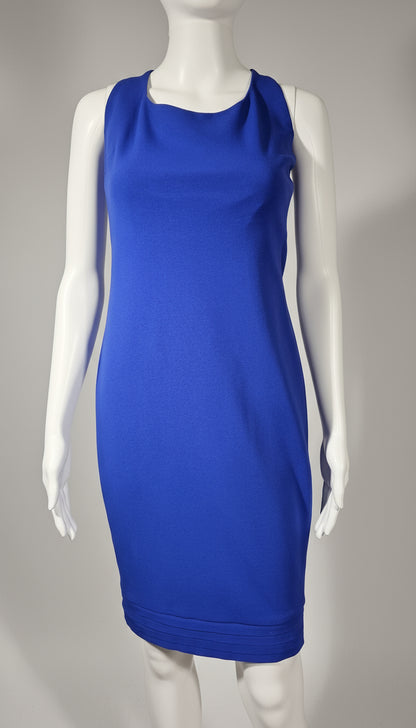 Blue dress on a mannequin against a gray background