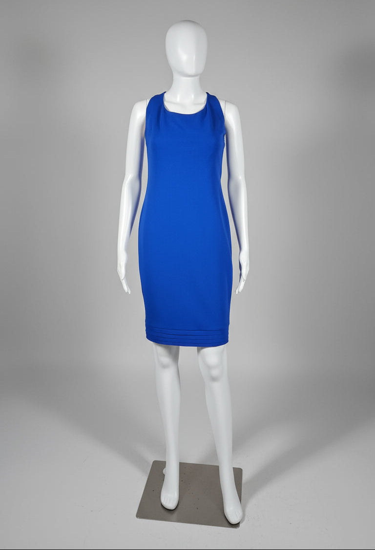 Mannequin wearing a blue dress on a gray background