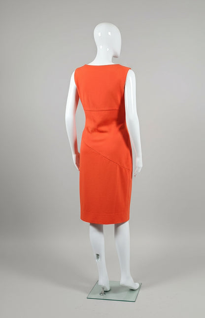 Red skirt on a mannequin against a neutral background