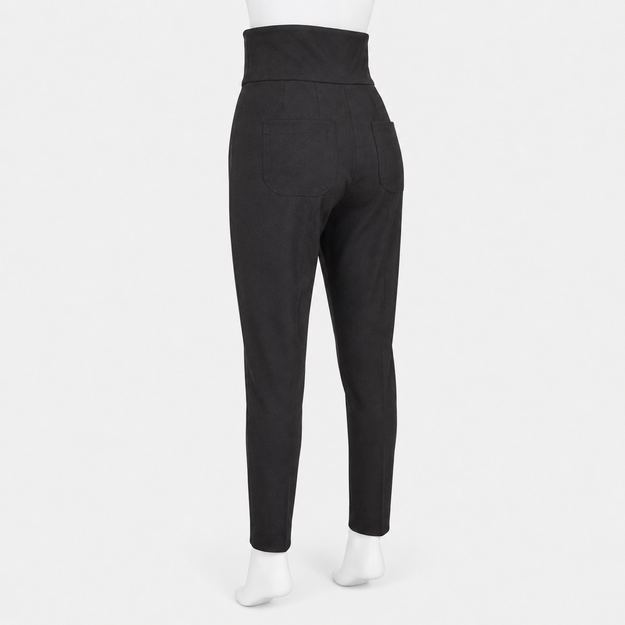 Black pants worn by a person on a white background