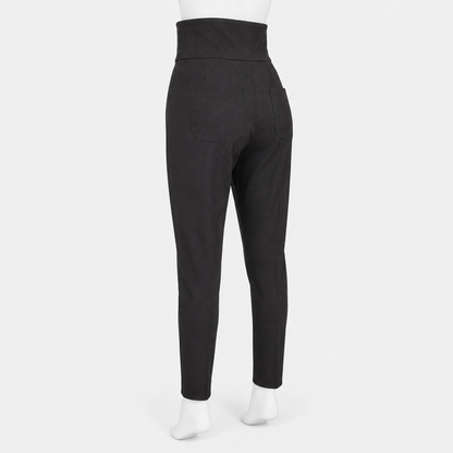 Black pants worn by a person on a white background