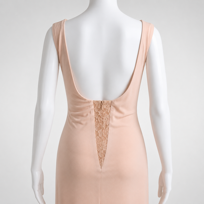 Mannequin wearing a beige dress with lace detailing on a white background