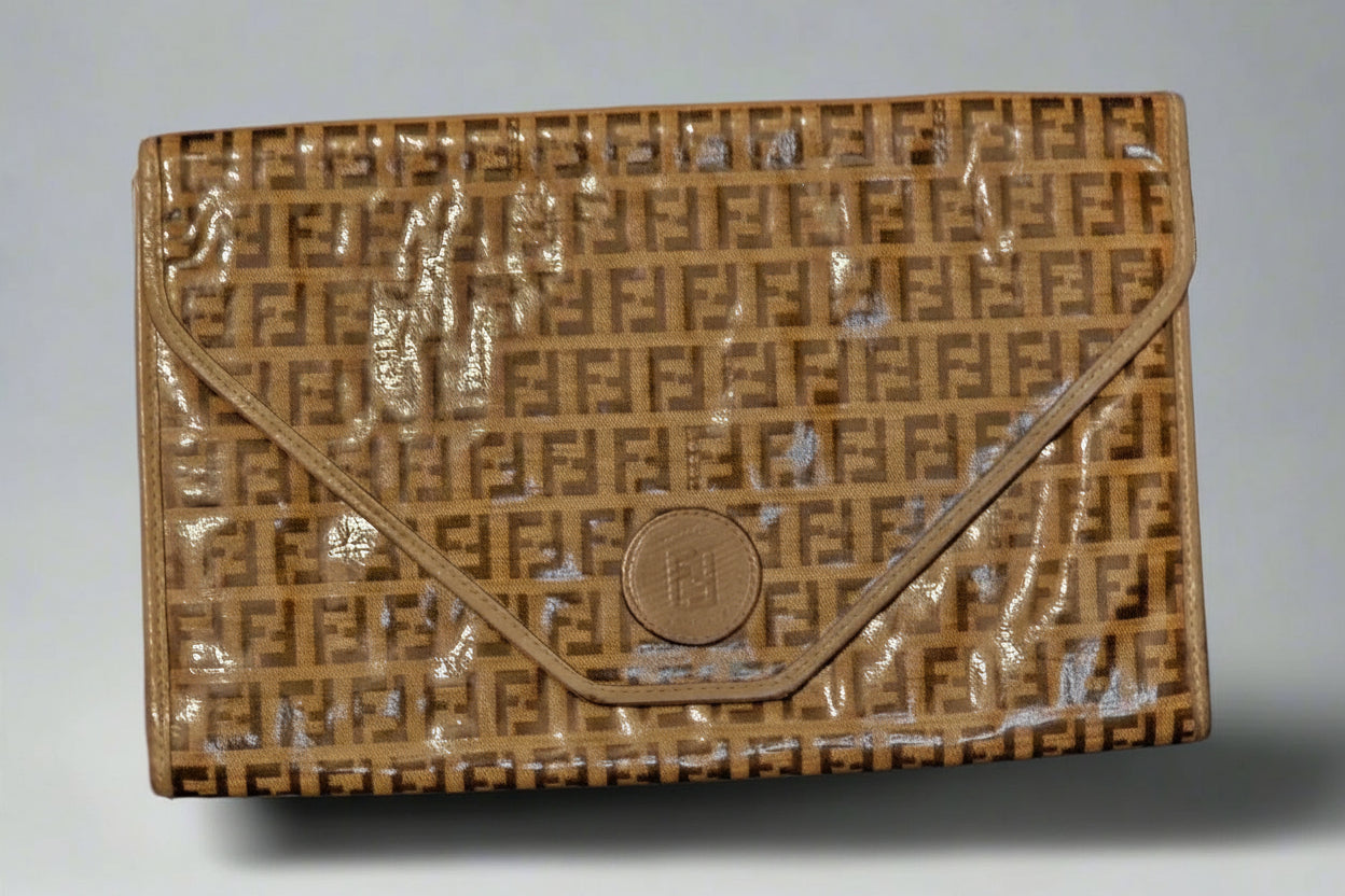 Brown textured clutch bag with a logo on a light gray background