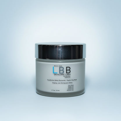 LBB Skincare Labs jar on a reflective surface with a neutral background
