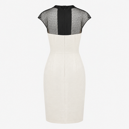 White dress with black mesh cap sleeves on a white background