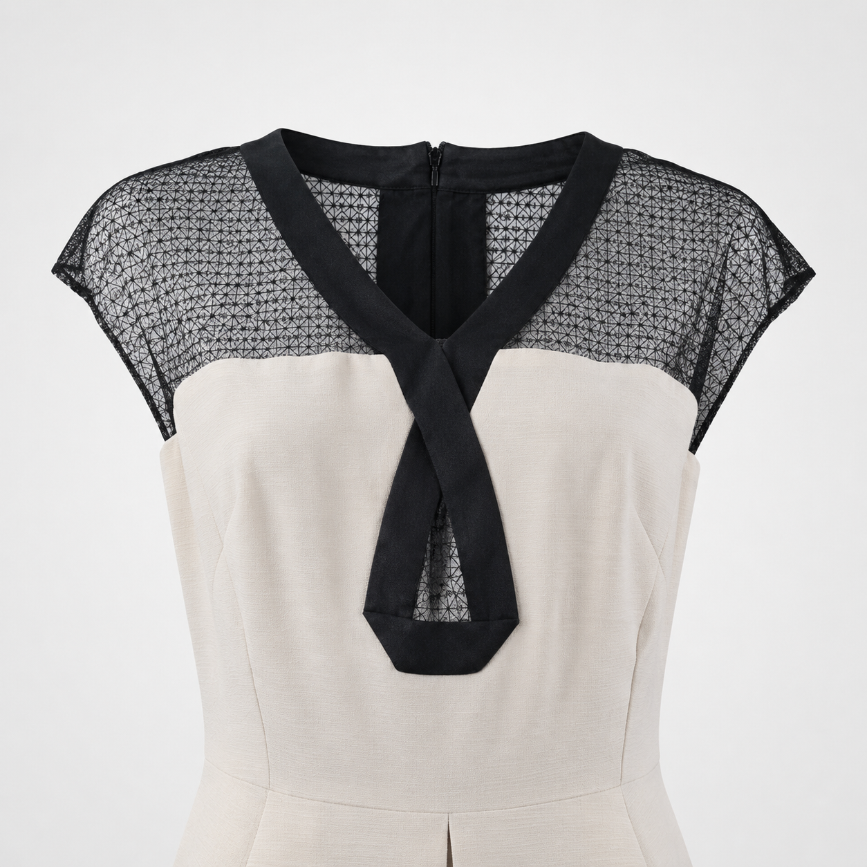 White dress with black mesh sleeves on a white background