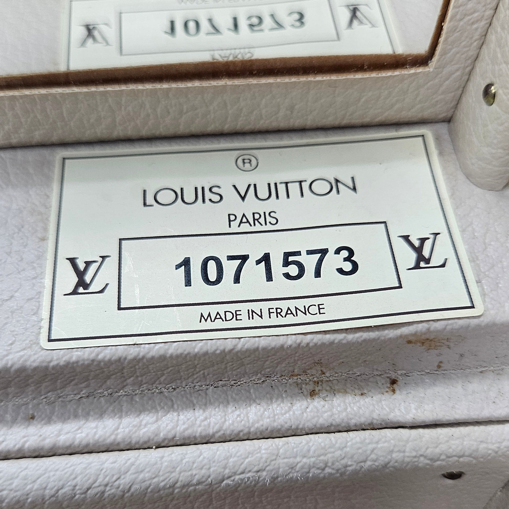 Louis Vuitton label on a product with visible model number