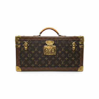 Louis Vuitton monogram suitcase on a white background
