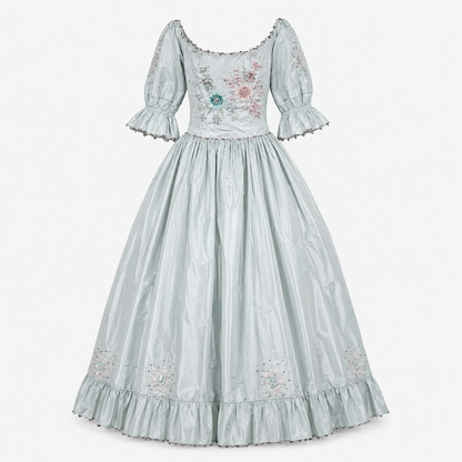 Light blue dress with floral embroidery on a white background