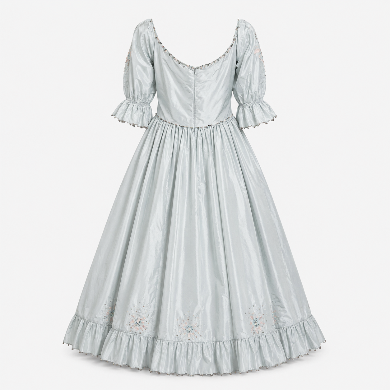 Light blue dress with lace details on a white background