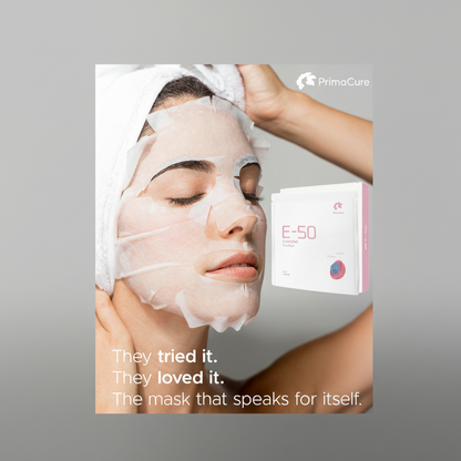 Woman wearing a face mask with PrimaCure packaging in the background