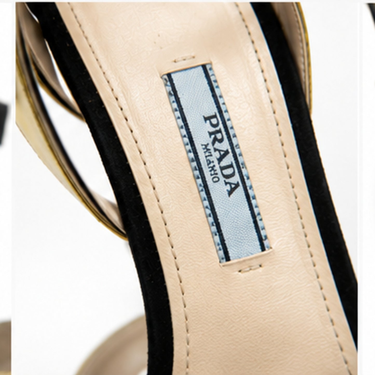 Loved By Lea: Prada black suede gold metallic platform sandals detail view of gold metallic leather straps