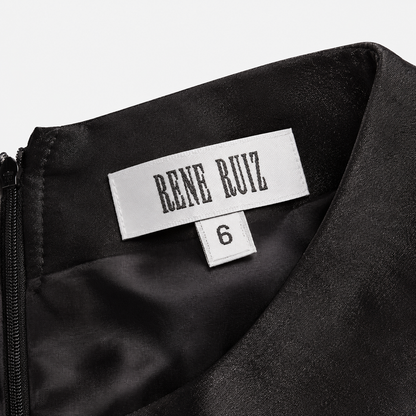 Black satin garment with 'Rene Ruiz' label on a white background