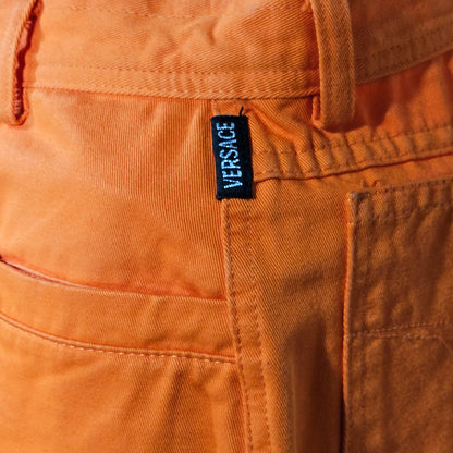 Close-up of  pants with a visible label on the pocket.