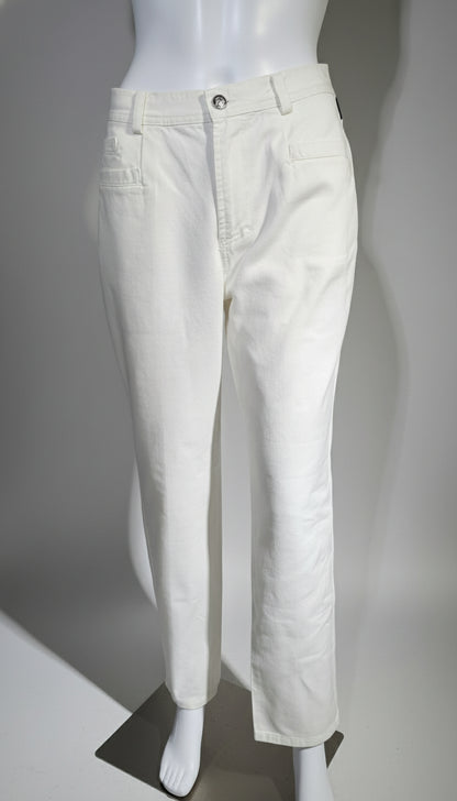 White pants on a mannequin against a plain background