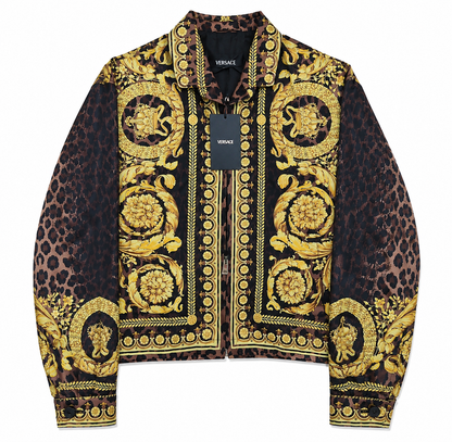 Versace jacket with gold and black pattern on a white background