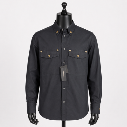 Loved By Lea: Versace Tribute Collection black poplin cotton shirt front view on mannequin showing gold Medusa head buttons at collar and dual chest pockets — new with tags
