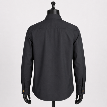 Loved By Lea: Versace Tribute Collection black poplin cotton shirt back view on mannequin showing clean structured silhouette and gold Medusa cuff buttons