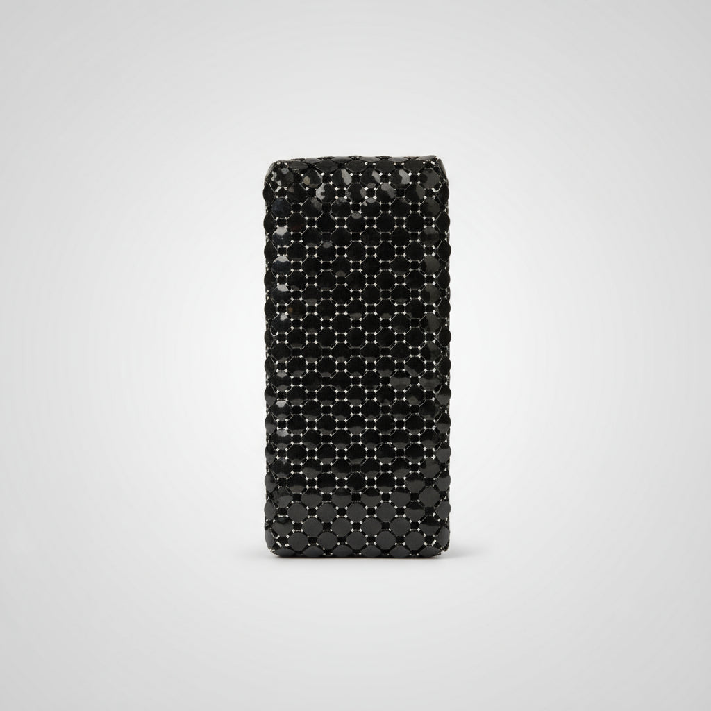 Black beaded clutch bag on a light gray background