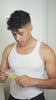 Jordanny applying Lea Black Beauty Brighten & Balance 200mg CBD Skin Toner to his face with a soft cloth.
