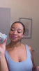 DaLaura applying Lea Black Beauty Premium Hemp Soothing Eye Cream around her under-eye area.