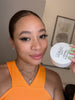 DaLaura applying Lea Black Beauty Hyaluronic Hydra-Gel Eye Patches and enjoying karaoke while they hydrate her under-eye area.