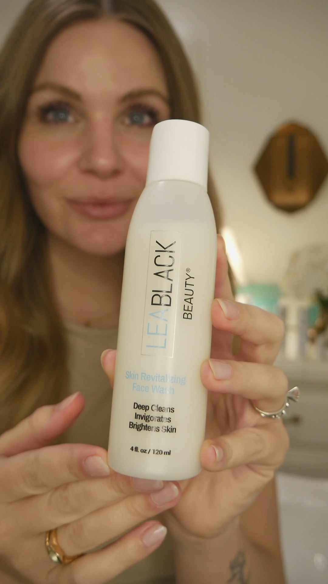 Leslie washing, rinsing and drying her face with Lea Black Beauty Skin Revitalizing Daily Face Wash.