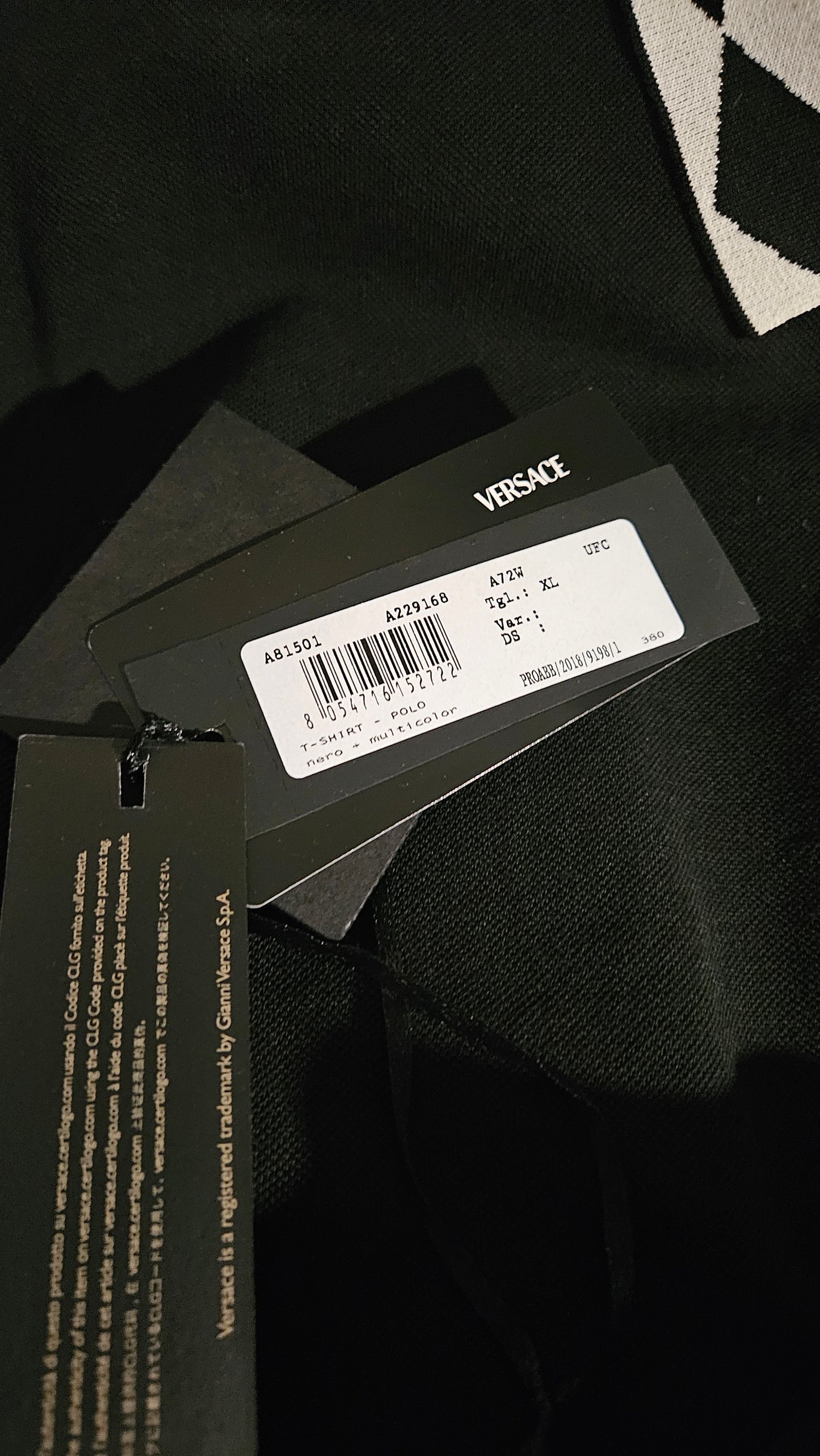 Close-up of a product packaging with a label on a dark background